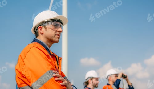 Preview: Professional engineer technician working outdoor at wind turbine field