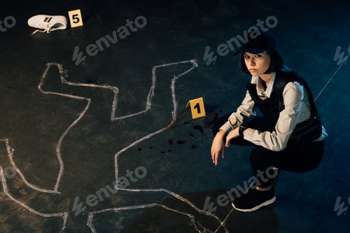 Preview: overhead view of investigator near chalk outline and evidence markers at crime scene