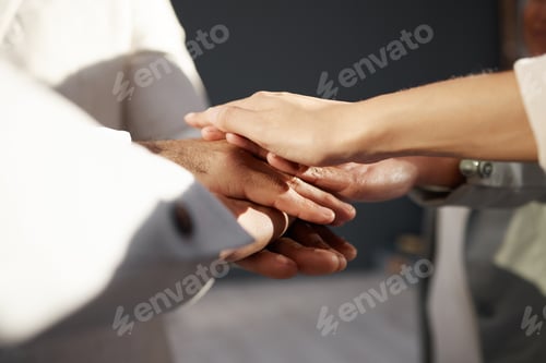 Preview: Business people, hands together and trust in team, collaboration and motivation in office. Support,