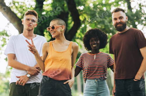 Preview: Interracial nature lovers posing and smiling at the camera.