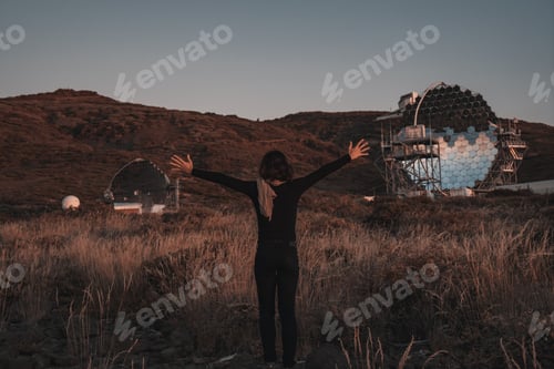 Preview: A young woman next to the new astronomical observatory