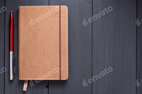 Preview: notepad and pen at black wooden background surface table
