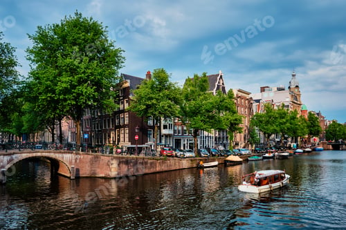 Preview: Amsterdam view - canal with boat, bridge and old houses