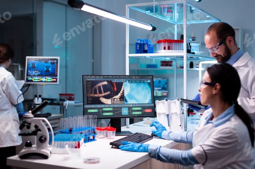 Preview: Team of scientist analyzing vaccine for virus