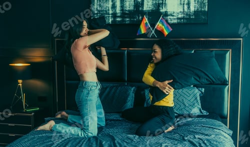 Preview: Lesbian partners' indoor pillow fight strengthens romance, and fills the room with affectionate.
