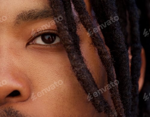 Preview: half face portrait of african man with dreadlocks