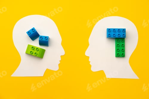 Preview: Papercut head silhouette with toy constructor pieces on yellow background