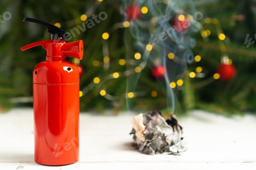 Preview: Prevention of fires from electric garlands, fire extinguisher against the background of tree