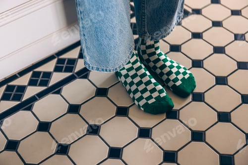 Preview: Green and white checkered socks worn by a person with denim jeans