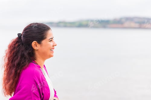 Preview: Happy mid Latin female on Asturias holiday during summer tourism vacation. Lifestyle Portrait