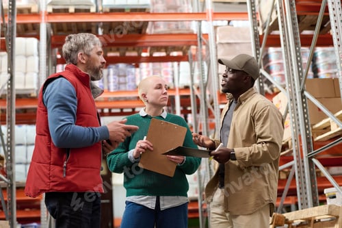 Preview: Warehouse workers discussing cargo delay