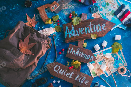 Preview: Road sign with Adventure, Unknown and Quiet Life directions. Travel essentials creative header