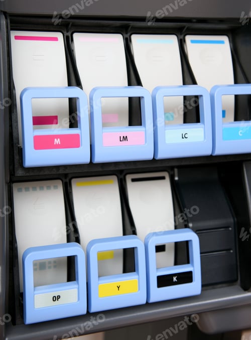 Preview: Large format printer showing ink cartridges and their colors
