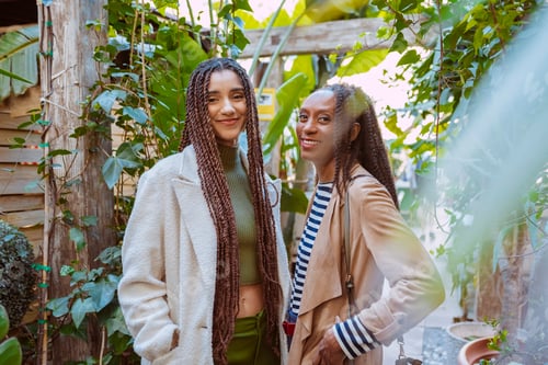 Preview: Friends enjoying time together in lush garden