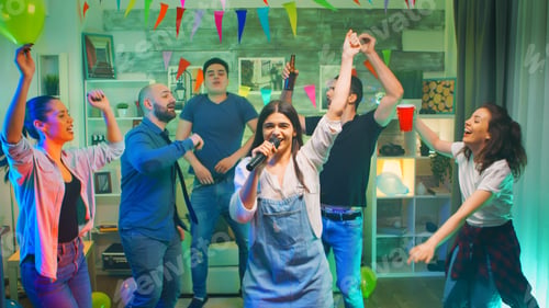 Vista previa: Beautiful young woman singing a song on microphone
