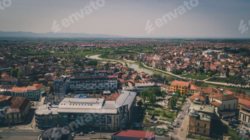 Preview: Aerial shot of a beautiful cityscape with a lake