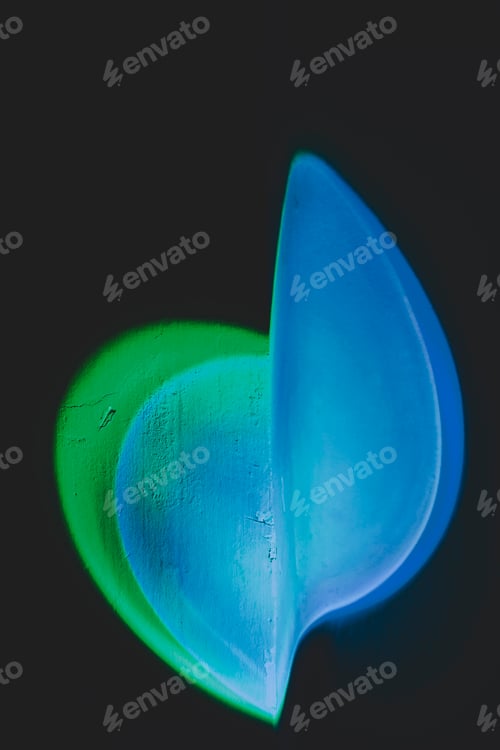 Preview: Abstract image of colorful shapes of light against black background