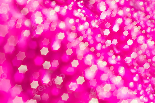 Preview: Defocused pink glitter background with star-shaped bokeh.