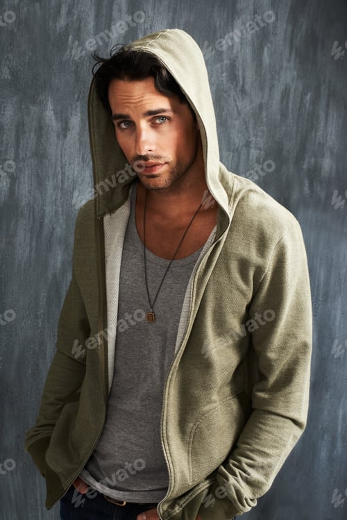 Preview: Handsome in a hoodie. Portrait of a handsome young man wearing a hoodie.