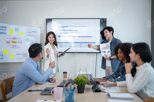 Preview: Group of Asian business people meeting to discuss and plan investment business and market analysis