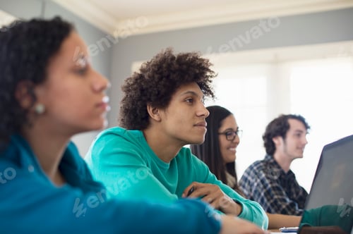 Preview: Students listening in classroom