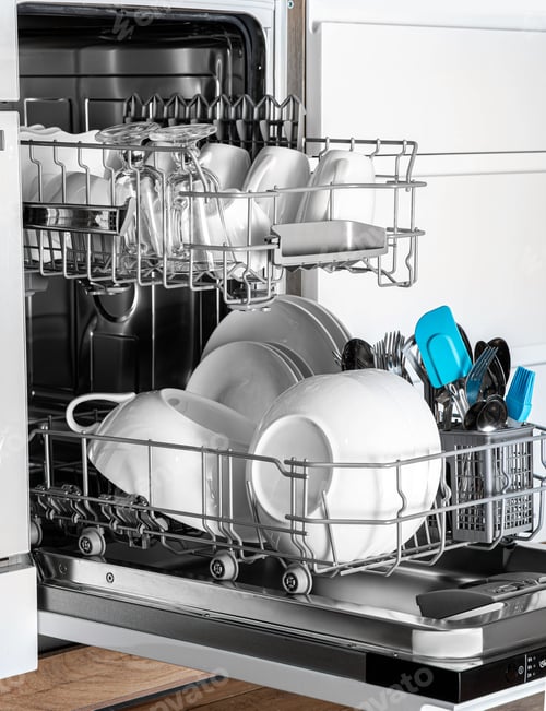 Preview: Clean dishes in a dishwasher basket close-up. The machine helps people in everyday life