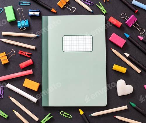 Preview: Back to school background. Blank label notebook on black color office supply flat lay, copy space