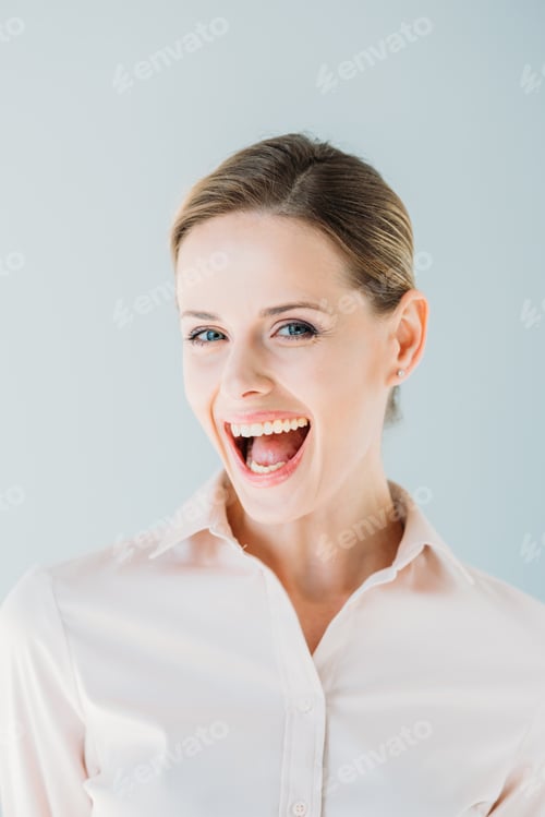 Preview: portrait of young adult caucasian businesswoman in formalwear with facial expression, isolated on