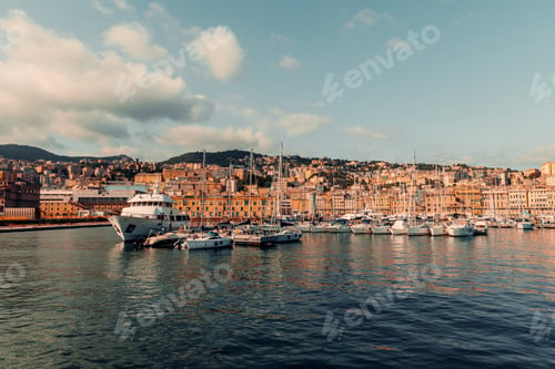 Preview: View of the port of Genoa full of yachts, boats - in the background high-rise buildings