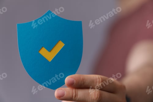 Preview: Man hand holding the shield privacy security icon