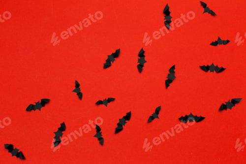 Preview: halloween and decoration concept - paper bats flying