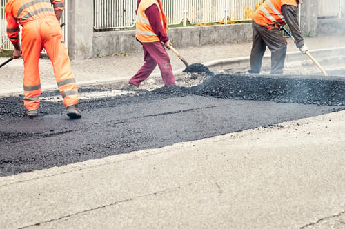 Preview: Workers on Asphalting paver machine during Road street repairing works