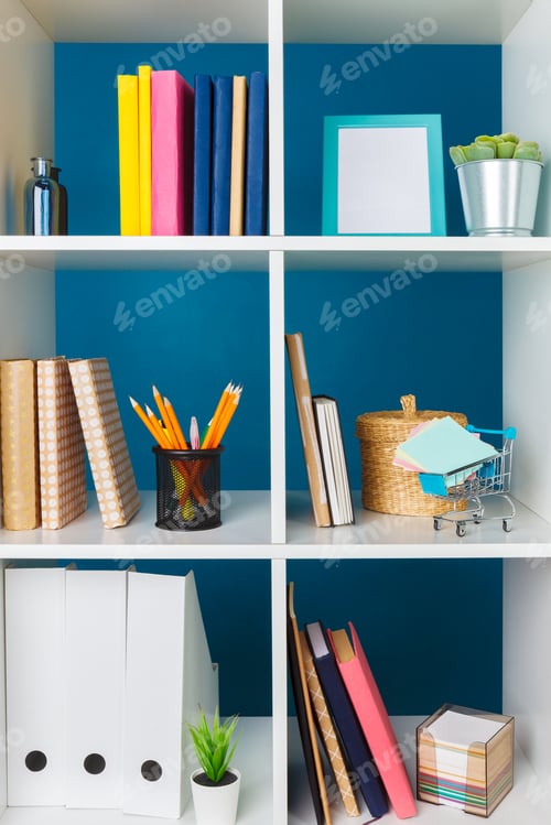 Preview: Stacks of supplies and paperwork in the office and bookshelves