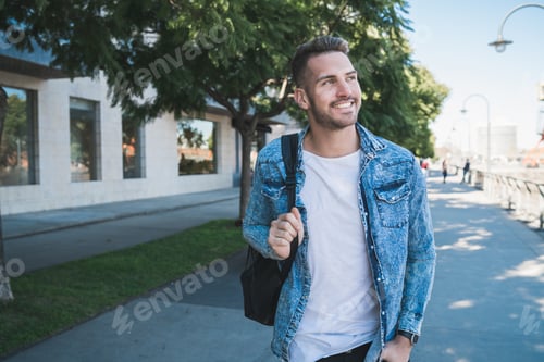 Preview: Man walking on the street.