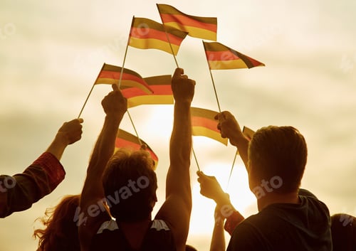 Preview: People hold german flags.
