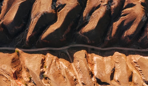 Preview: Aerial view of mountain and roads at daytime. Natural sunlight