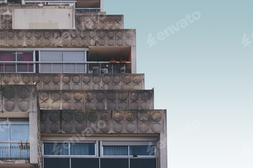 Preview: Old cement building with the blue sky in the background