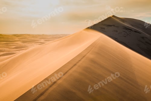 Preview: Beautiful sunset in the desert above the sand dunes