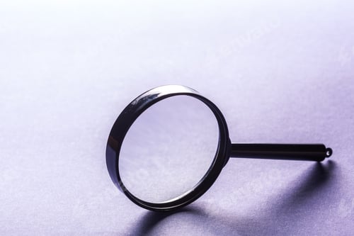 Preview: Magnifier on blue background close up