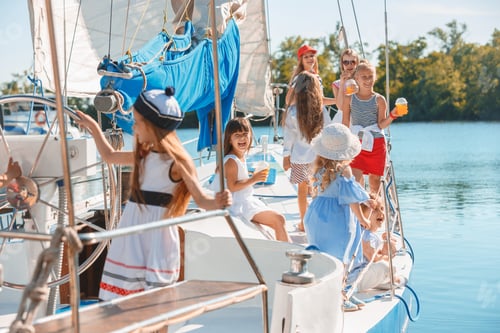 Preview: The children on board of sea yacht