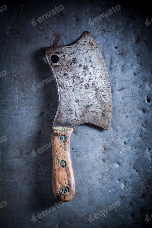 Preview: Rustic metal chopper on old metal table
