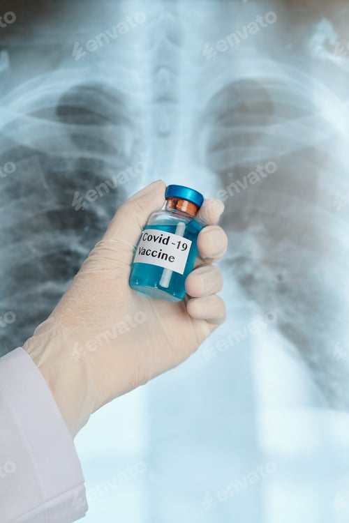 Preview: Pulmonologist holding covid-19 vaccine