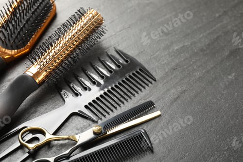 Preview: Different barber's tools on black table, closeup. Space for text