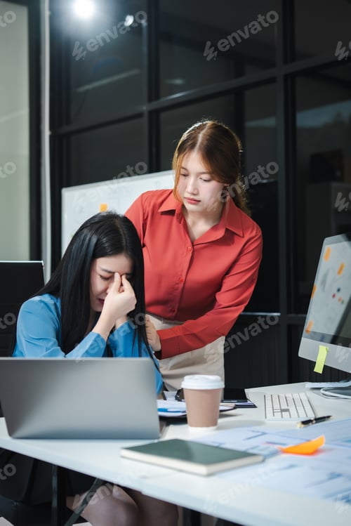 Preview: Business woman arguing laptop computer problems highlighting customer dissatisfaction.