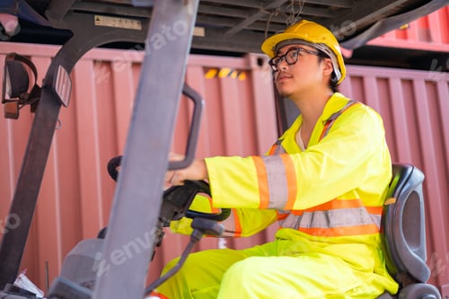 Preview: Engineer loads goods by forklift to stack containers