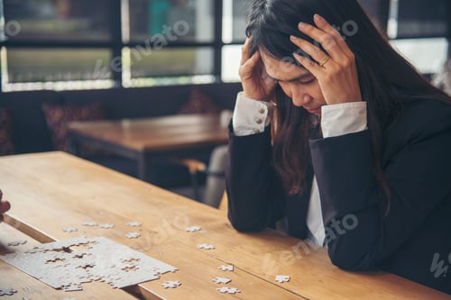 Preview: Asian businesswoman overworked at office stressful anxiety with serious problems. Woman exhaustion
