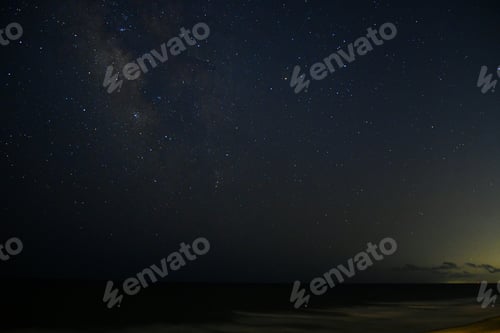 Preview: Milky Way night sky stars over the ocean beach, star gazing