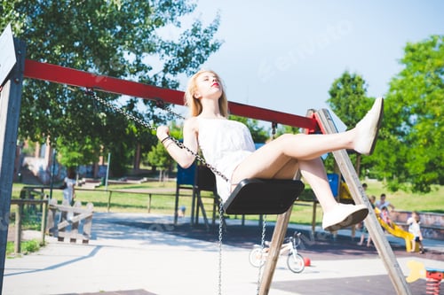 Preview: young blonde woman in the city