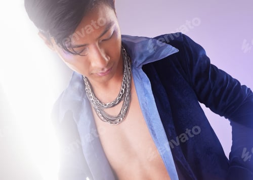 Preview: Stylish, edgy and cyberpunk man with fashion isolated on a purple studio background. Creative, futu