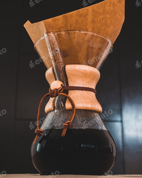 Preview: Vertical low angle shot of freshly brewed coffee with paper filters